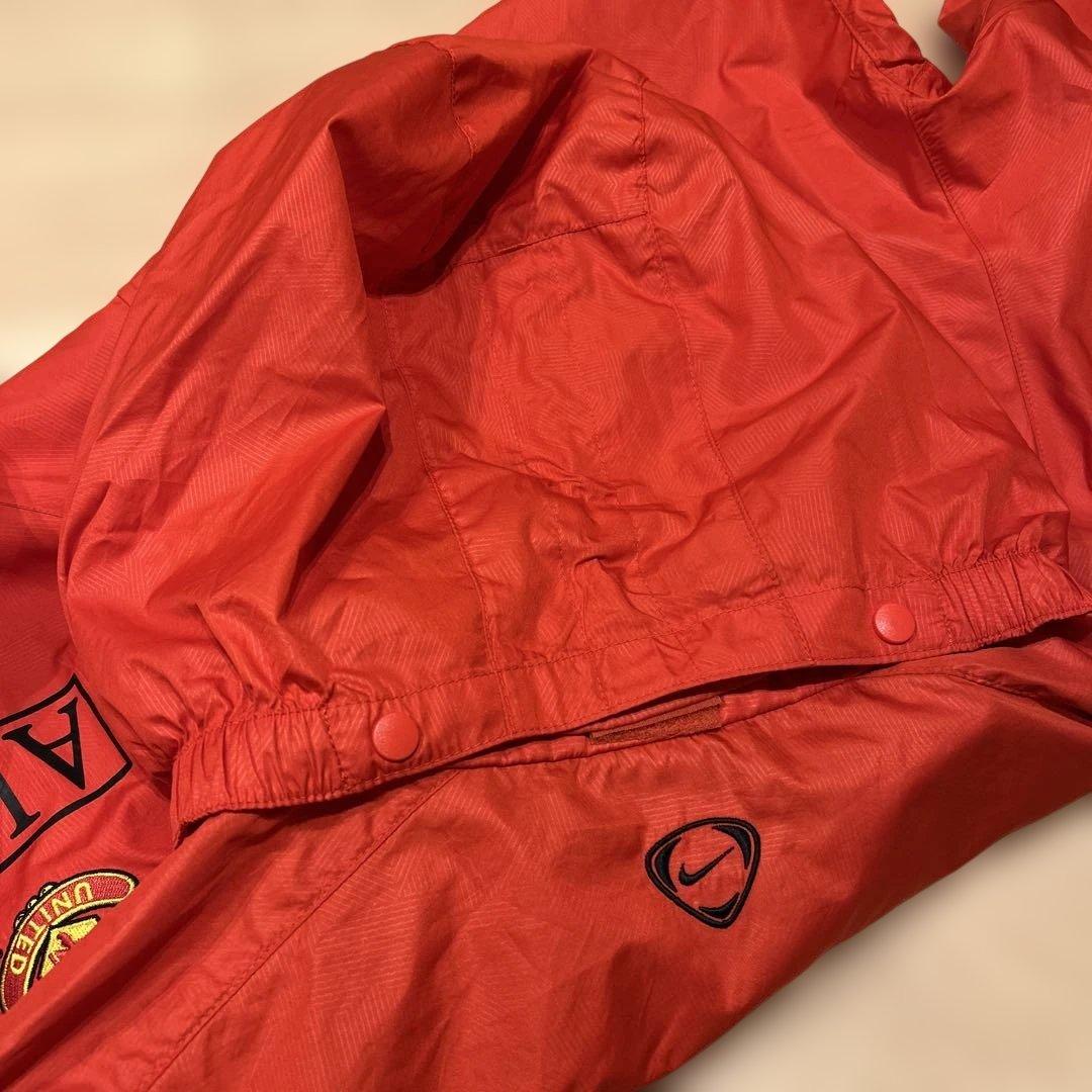 Nike マンチェスター・ユナイテッド ウィンドブレーカー オレンジ