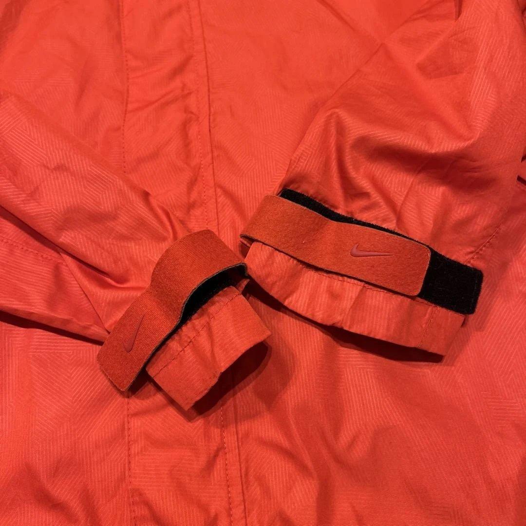 Nike マンチェスター・ユナイテッド ウィンドブレーカー オレンジ