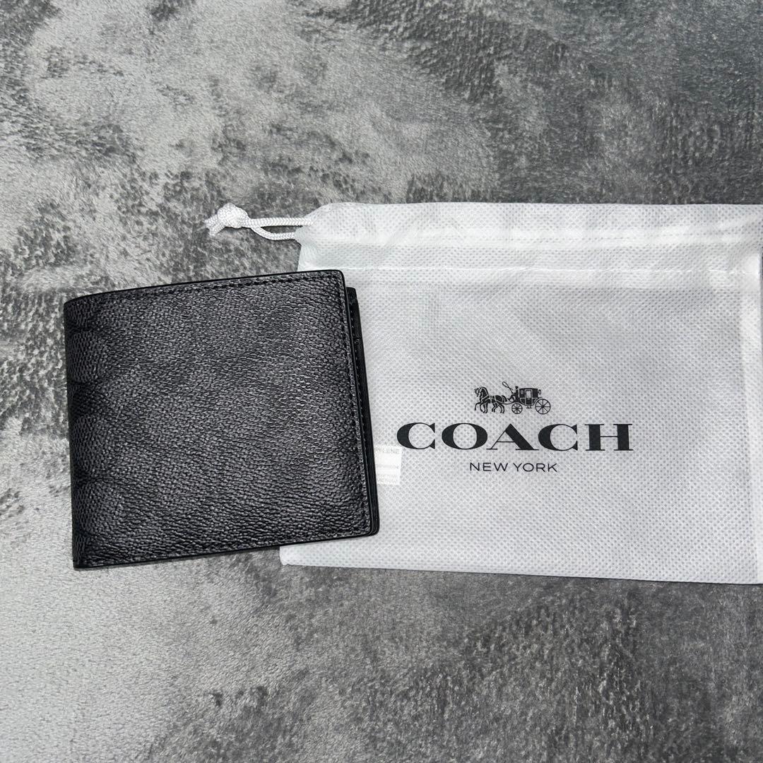 COACH ブラック 二つ折り財布 保存袋付き