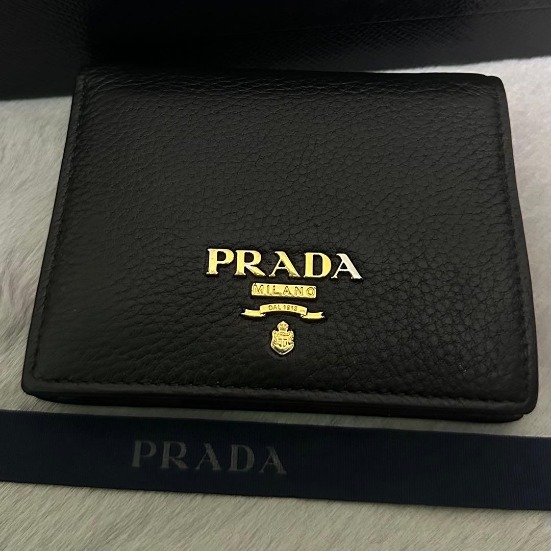 PRADA プラダ　折り財布　ゴールドロゴ　シボ革　バイカラー　赤　黒