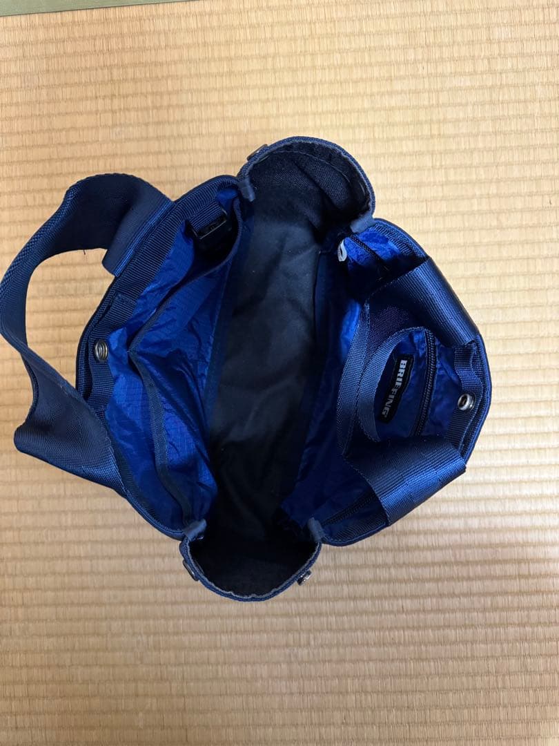 BRIEFING ネイビー ラウンドバッグ