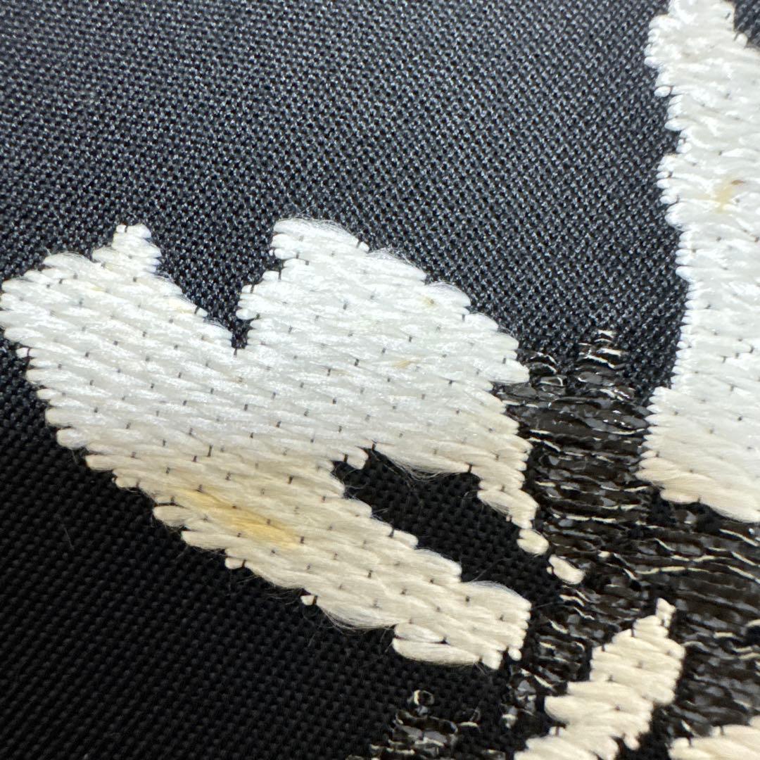 龍村平蔵製　本袋帯　黒地　金銀糸　秀繭錦