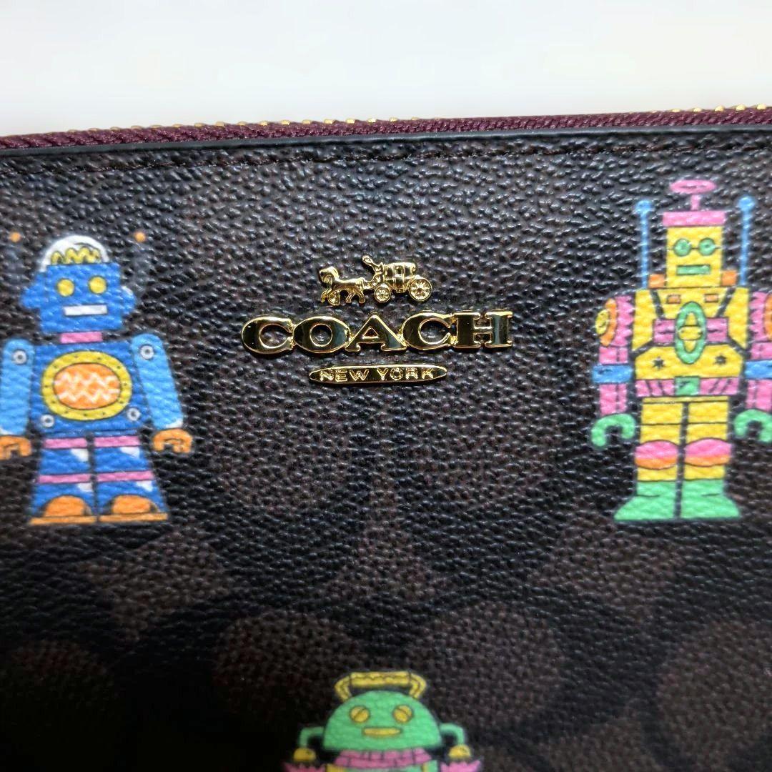 新品 COACH コーチ ロボット柄 ラウンドファスナー 長財布