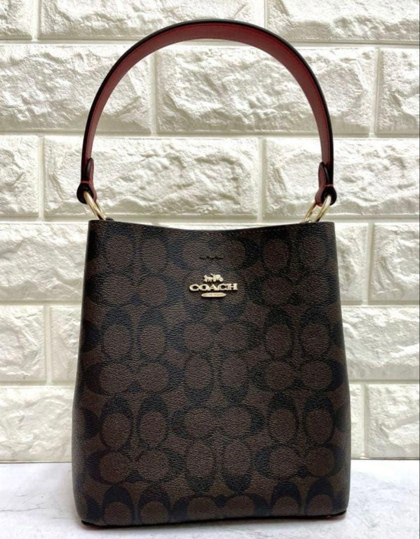コーチ　シグネチャー　スモールタウンバケットバッグ