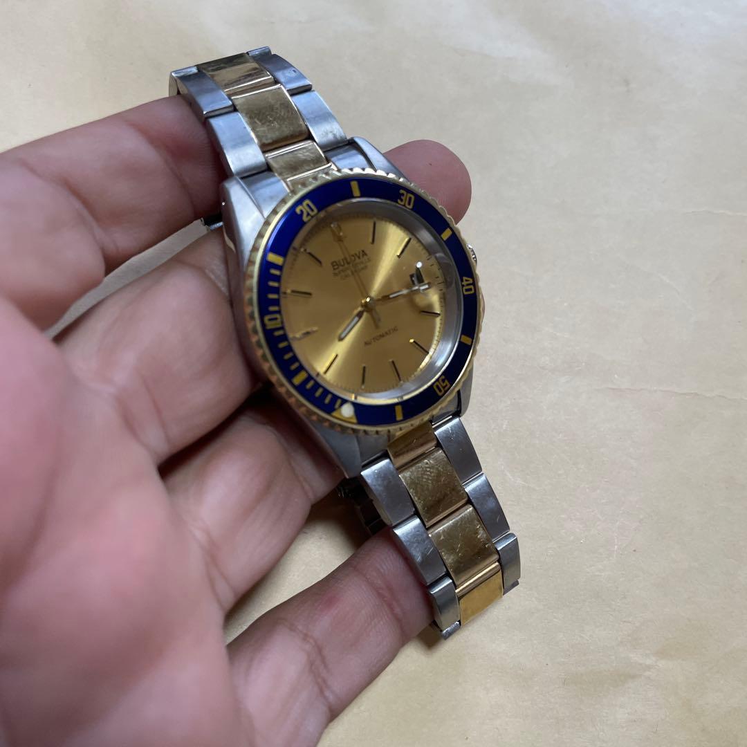 E*y様 Bulova 自動巻き 腕時計 金色/青色