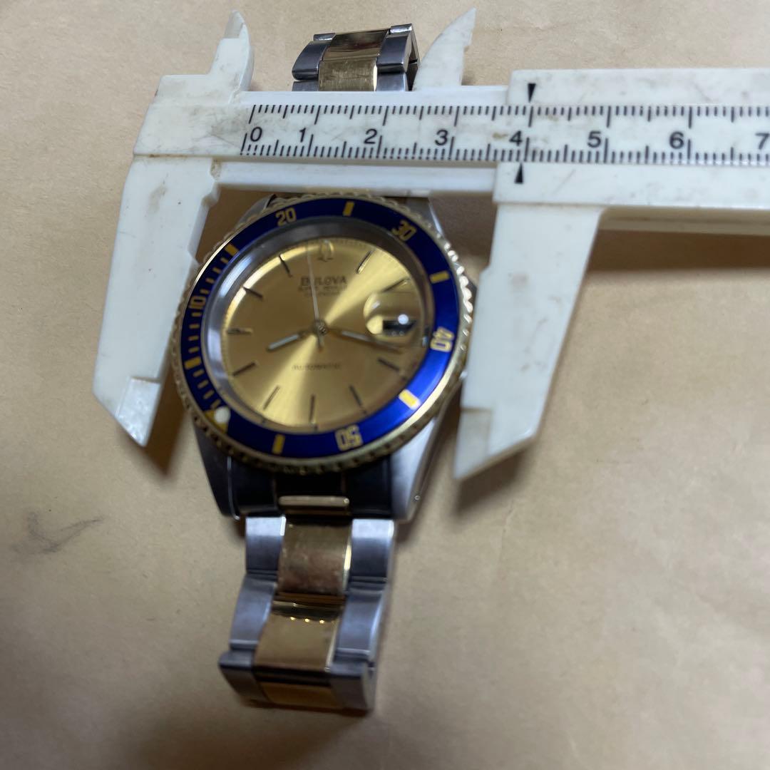 E*y様 Bulova 自動巻き 腕時計 金色/青色