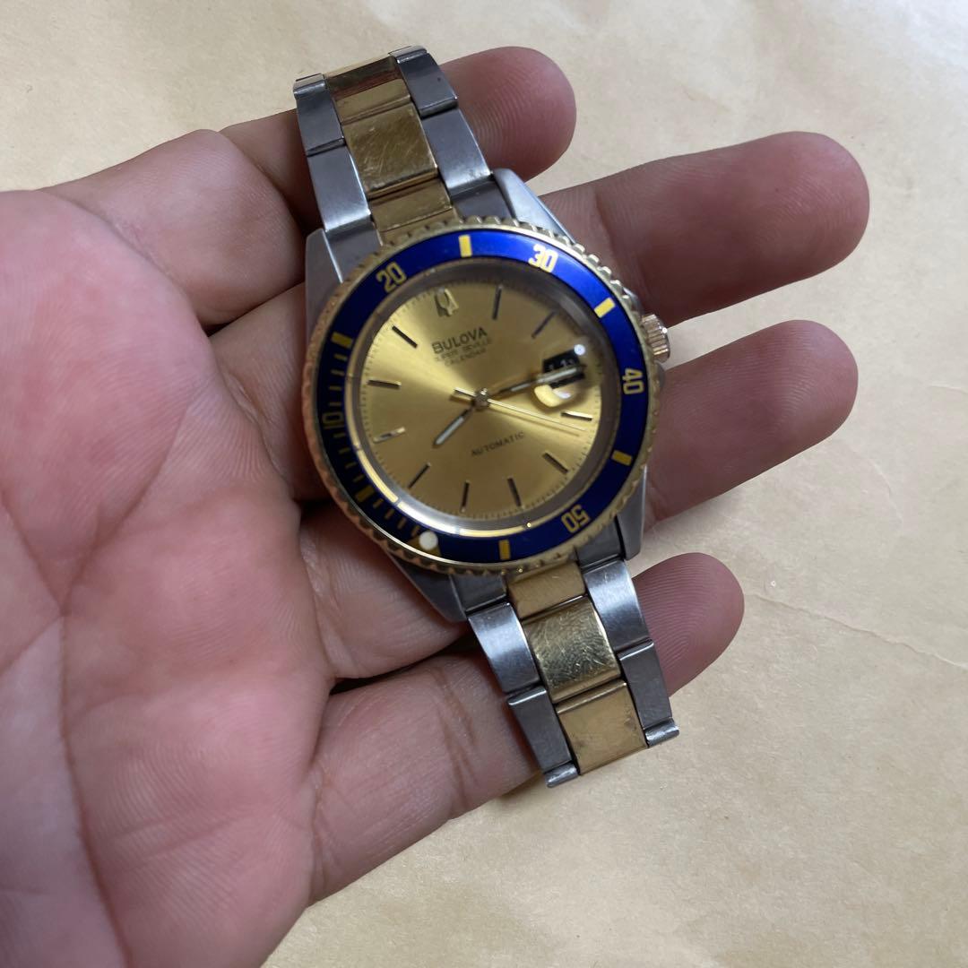 E*y様 Bulova 自動巻き 腕時計 金色/青色