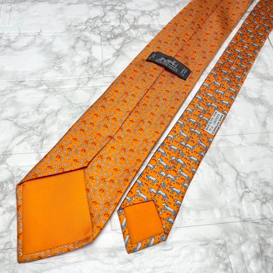 HERMES エルメス　ネクタイ馬蹄　馬　オレンジ