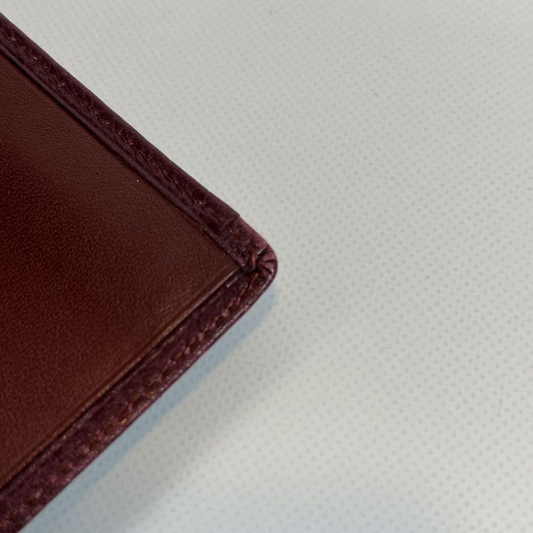 Cartier マネークリップ　二つ折り財布　小銭入れ付き　レザー　ボルドー