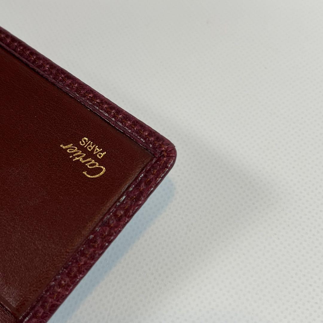 Cartier マネークリップ　二つ折り財布　小銭入れ付き　レザー　ボルドー