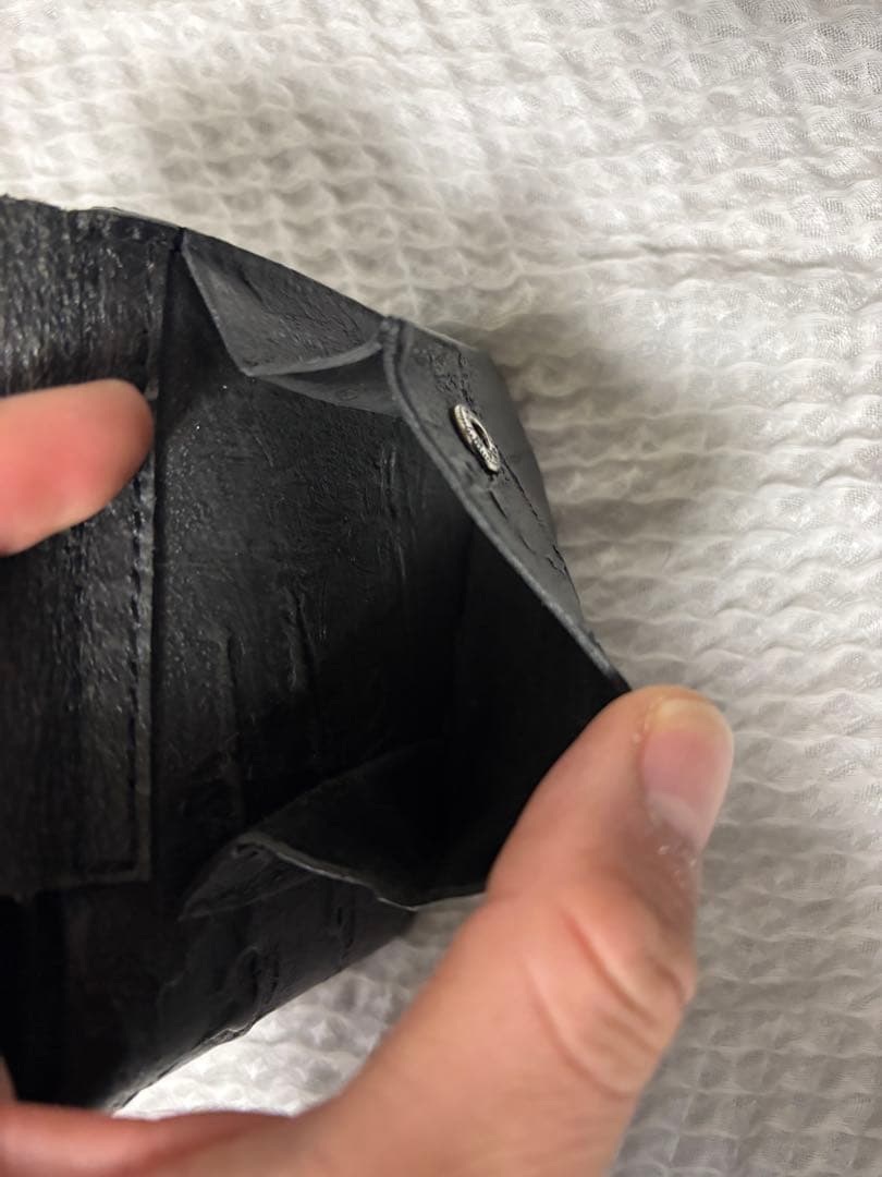 カガリユウスケ　二つ折り財布 [黒い壁] / mw06-bk