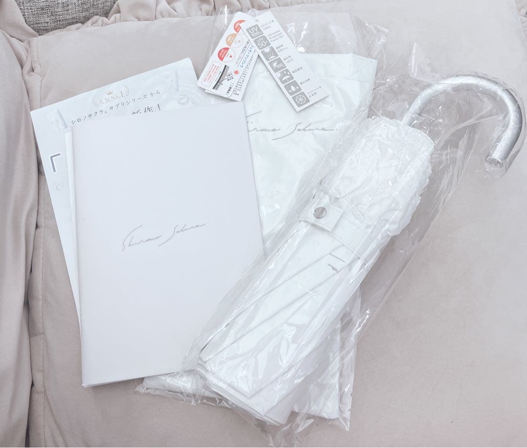 シロノサクラ。折りたたみ日傘 ホワイト