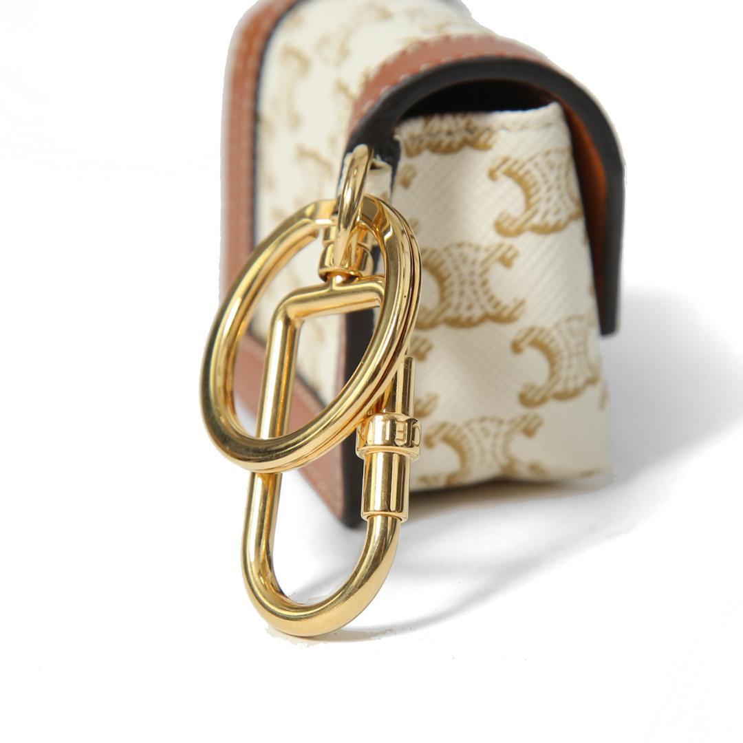 CELINE ミニ バーティカル カバ トリオンフ キャンバス エアポッズケース