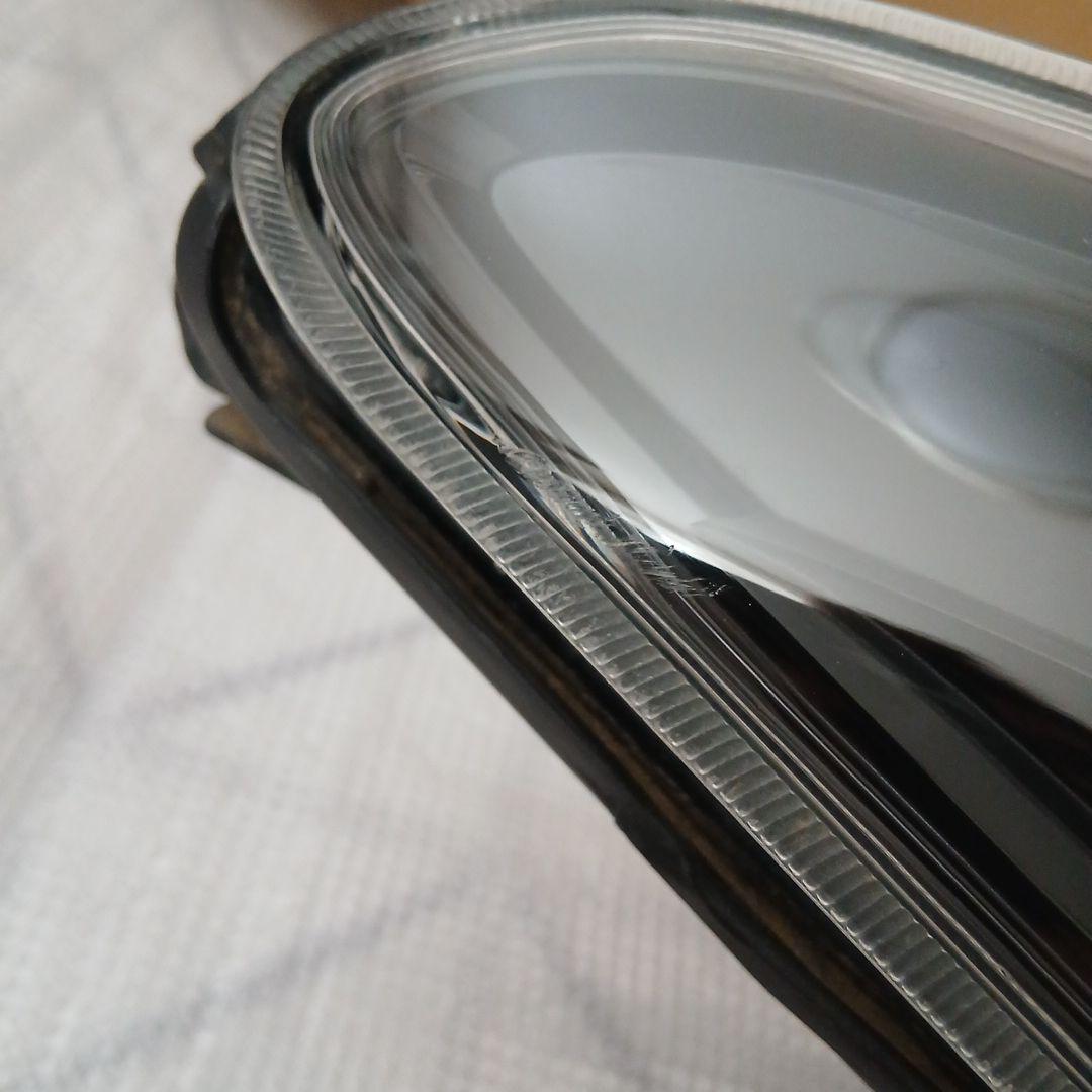 トヨタ　カローラフィルダー　運転席側ヘッドライト中古KOITO12-657