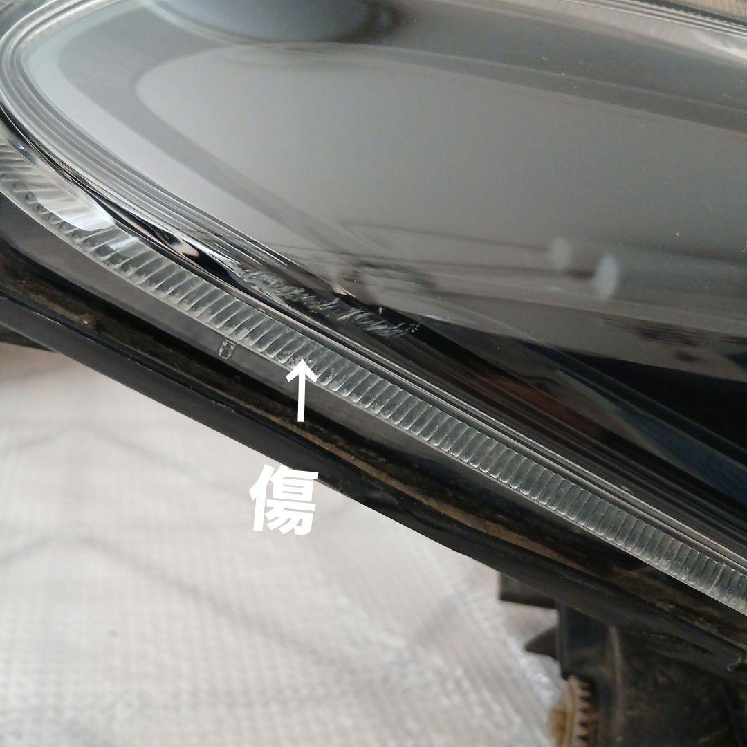 トヨタ　カローラフィルダー　運転席側ヘッドライト中古KOITO12-657