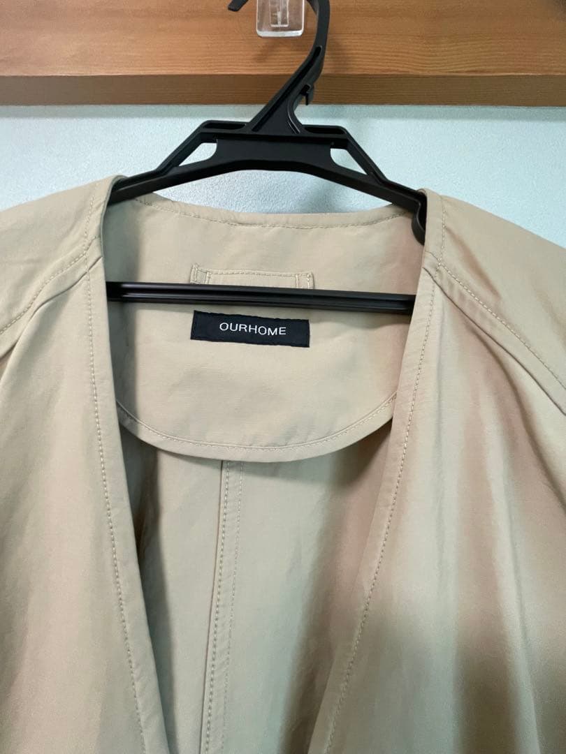 our 頼れるノーカラーコート