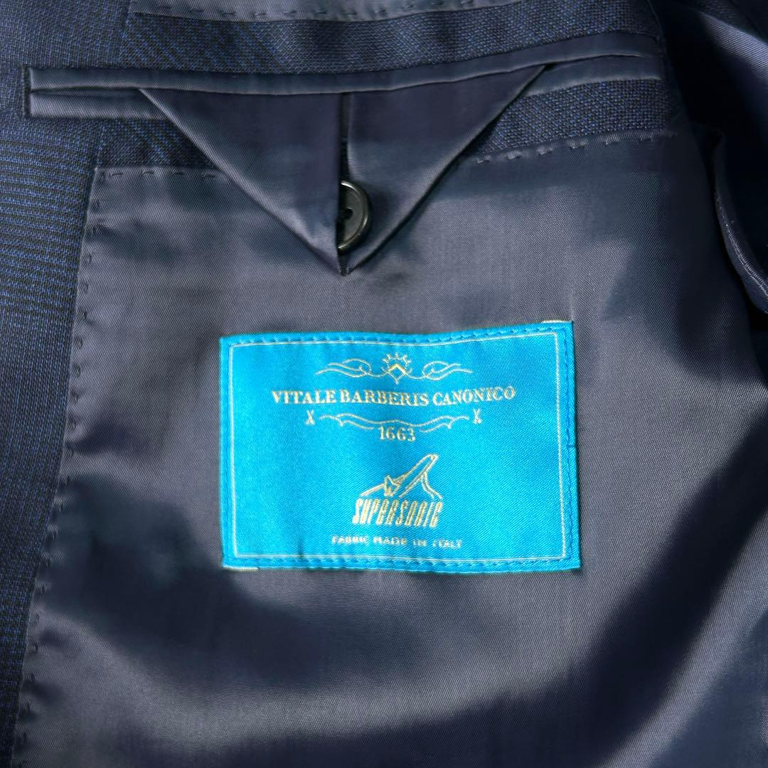 美品 ユニバーサルランゲージ カノニコ スーパーソニック ダブルスーツ M 紺