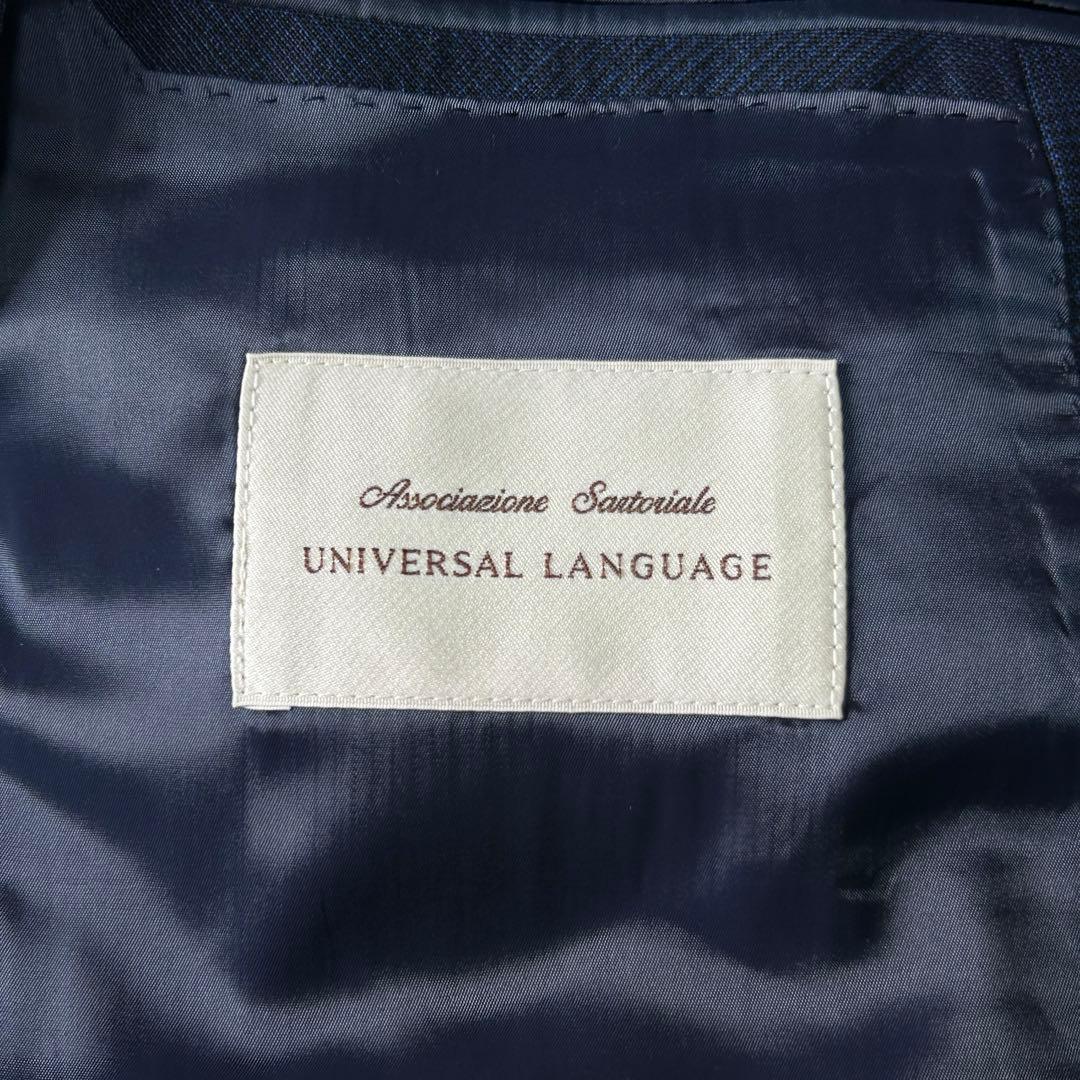 美品 ユニバーサルランゲージ カノニコ スーパーソニック ダブルスーツ M 紺