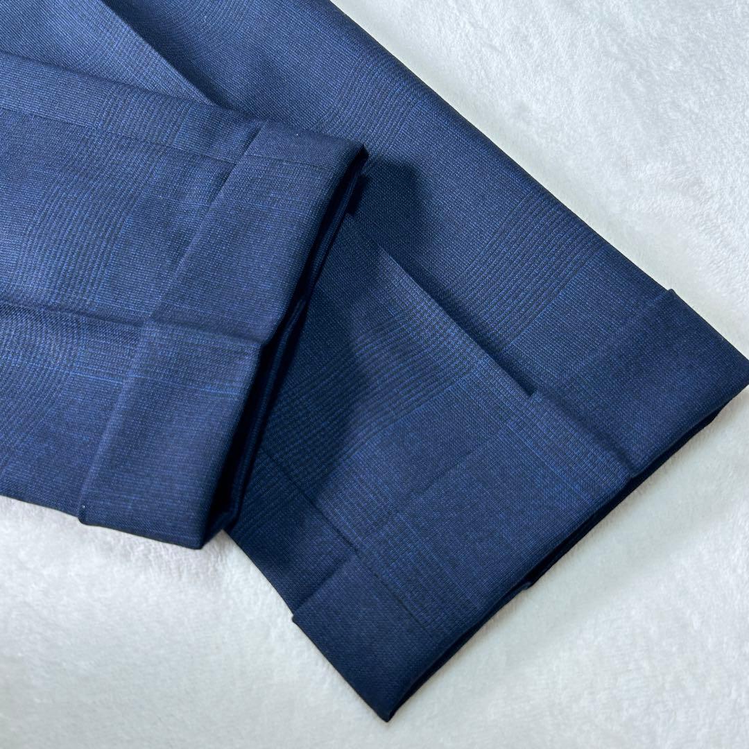 美品 ユニバーサルランゲージ カノニコ スーパーソニック ダブルスーツ M 紺