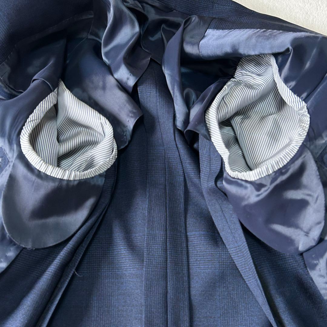 美品 ユニバーサルランゲージ カノニコ スーパーソニック ダブルスーツ M 紺