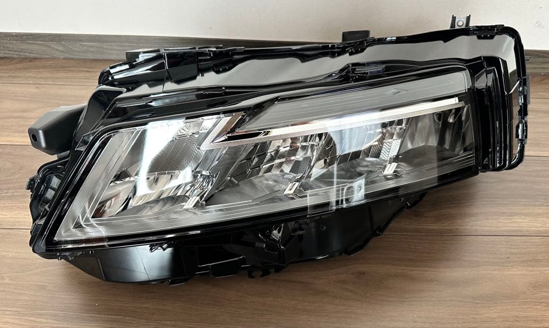 日産　エクストレイル　左ヘッドライト　ユニット