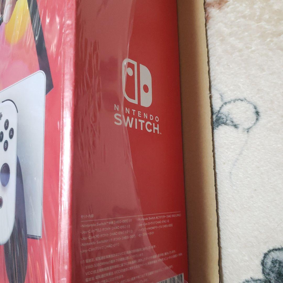 新品未開封NintendoSwitch 有機el＋どうぶつの森ソフト＋攻略本　②