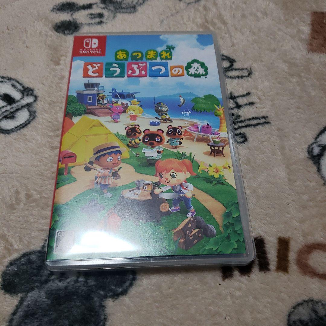 新品未開封NintendoSwitch 有機el＋どうぶつの森ソフト＋攻略本　②