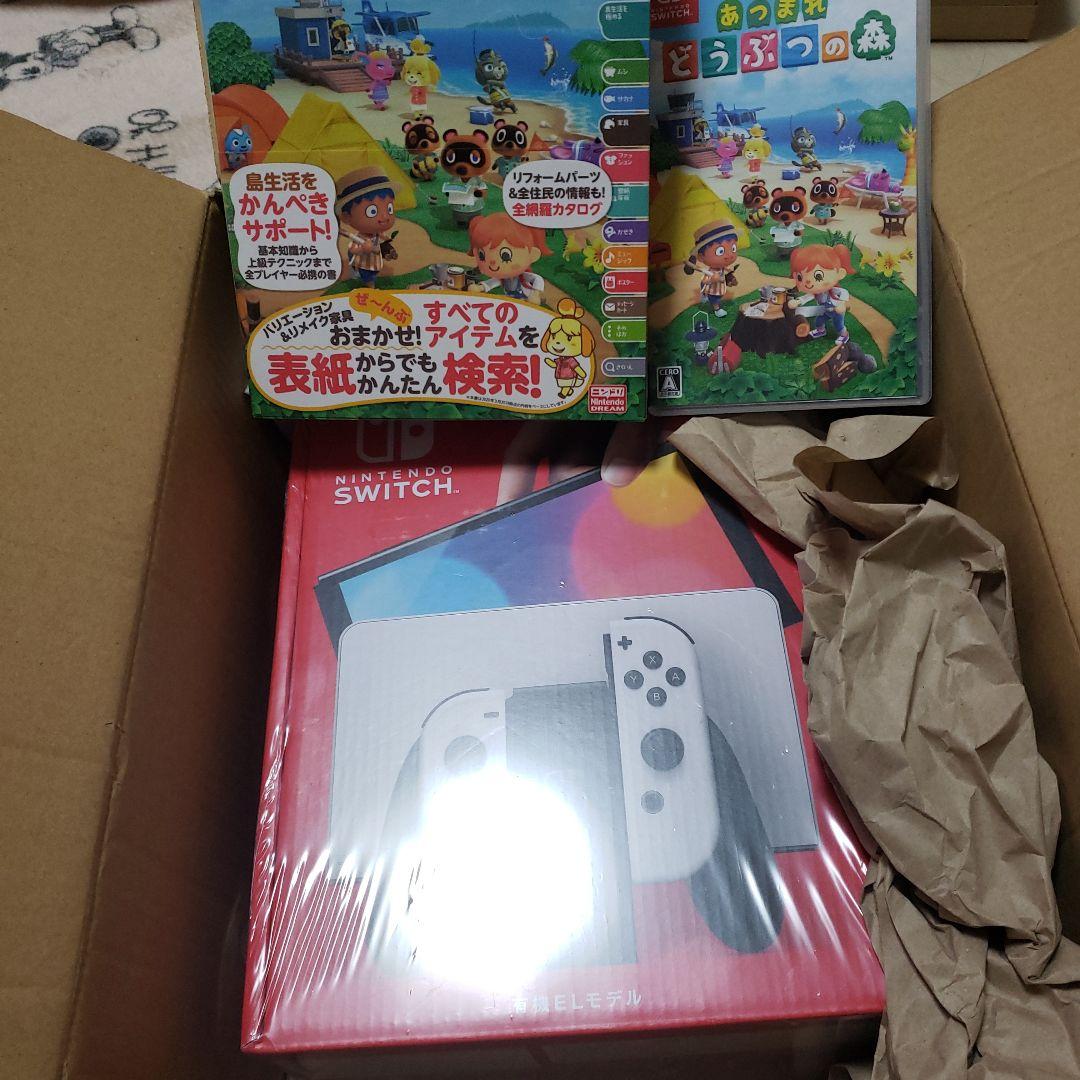 新品未開封NintendoSwitch 有機el＋どうぶつの森ソフト＋攻略本　②