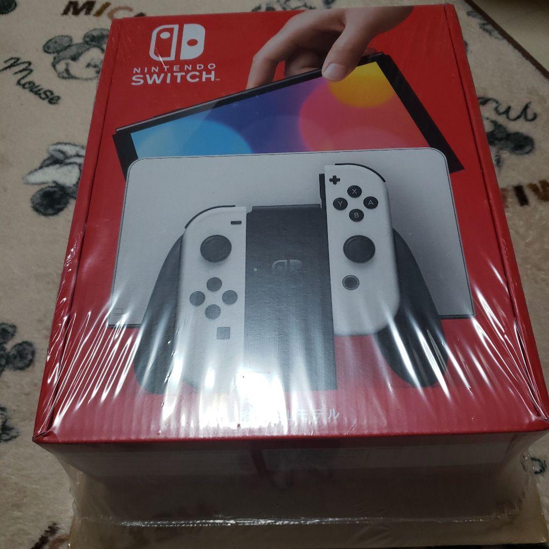 新品未開封NintendoSwitch 有機el＋どうぶつの森ソフト＋攻略本　②