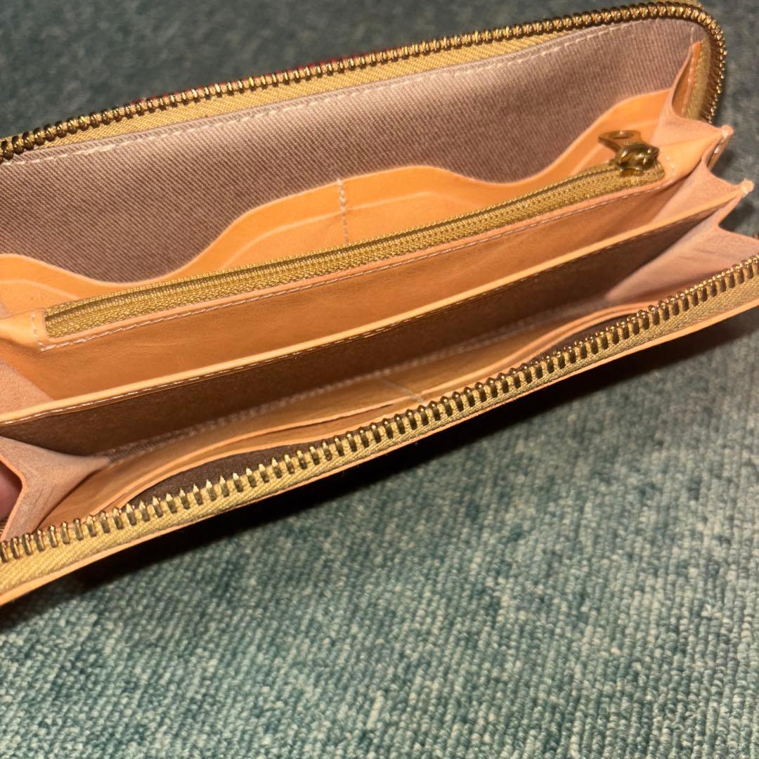 イルビゾンテ　レザー製二つ折り財布 ベージュと赤