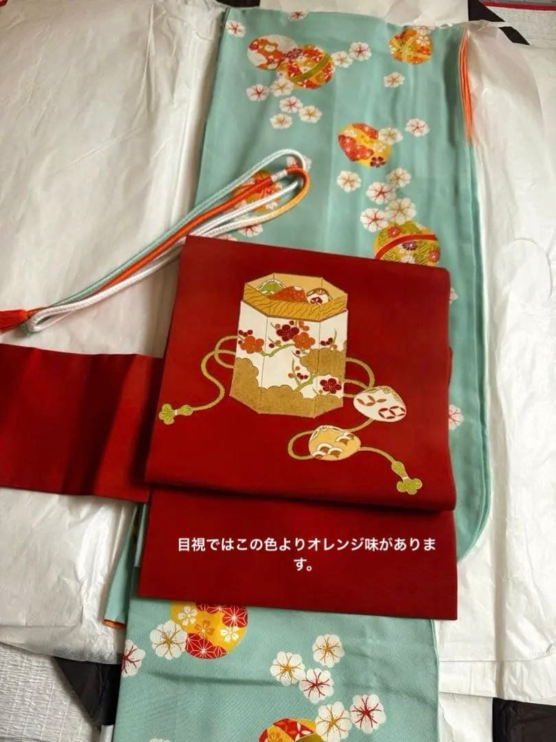 志ま亀　オレンジ地　塩瀬　名古屋帯　貝桶柄