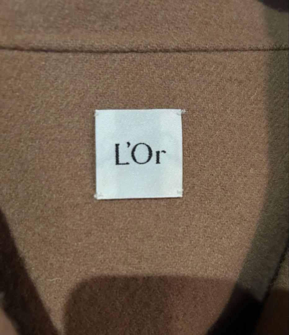 L'Or(ロル) Irregular hem cape coat ケープコート