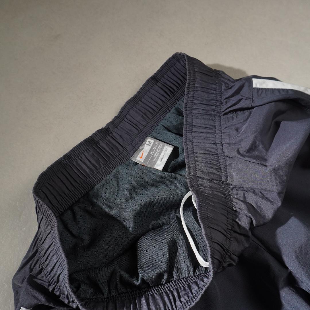 00s NIKE サイドライン ナイロントラックパンツ 裾ジップ/DZ165