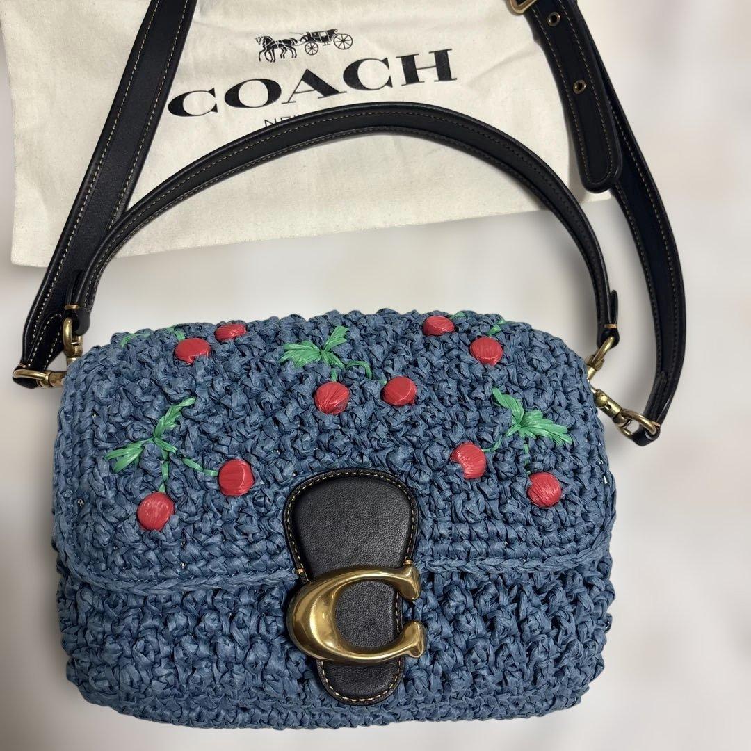 COACH チェリー柄ストロー素材ハンドバッグ