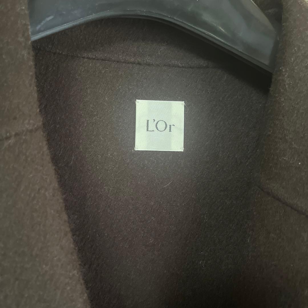 L'Or ロルlaubeblanc rregular hem Cape Coat