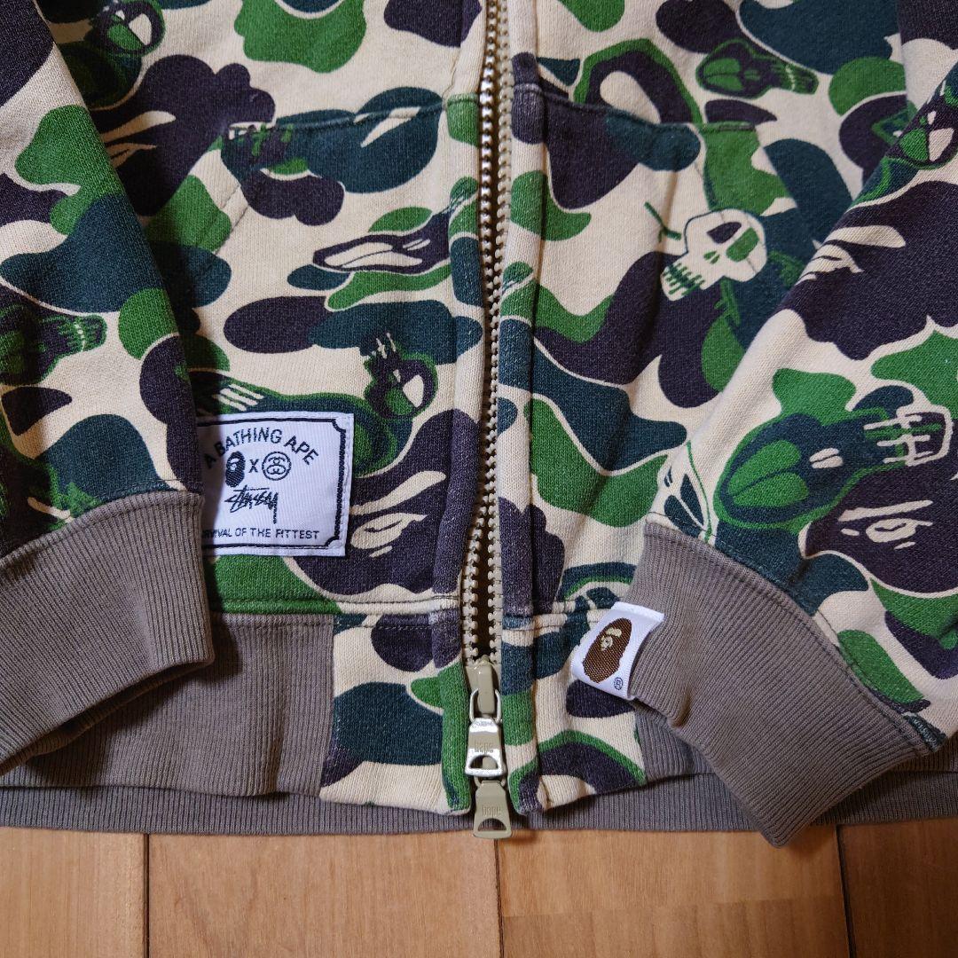 A BATHING APE × STUSSY 110 ダブルジップ パーカー
