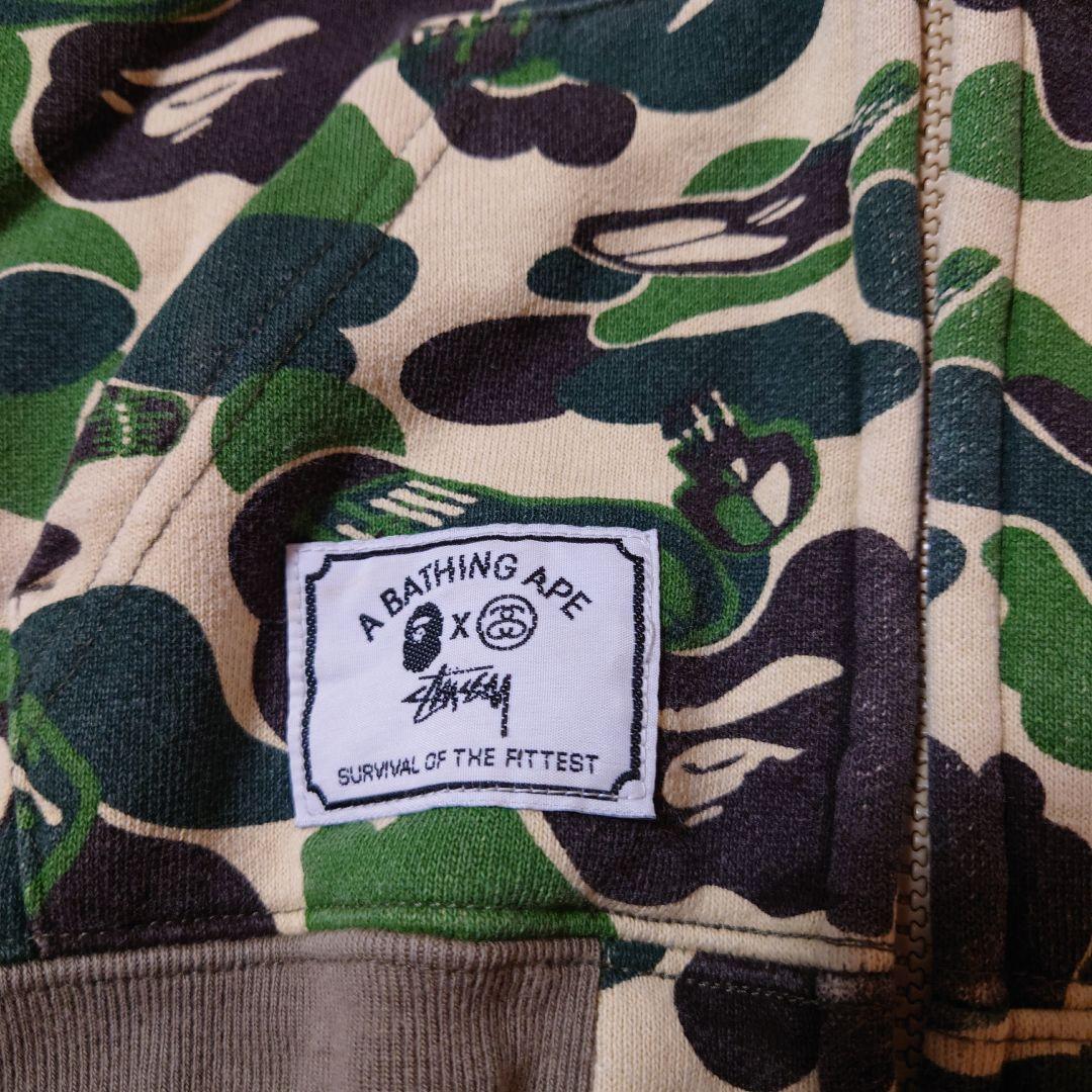 A BATHING APE × STUSSY 110 ダブルジップ パーカー