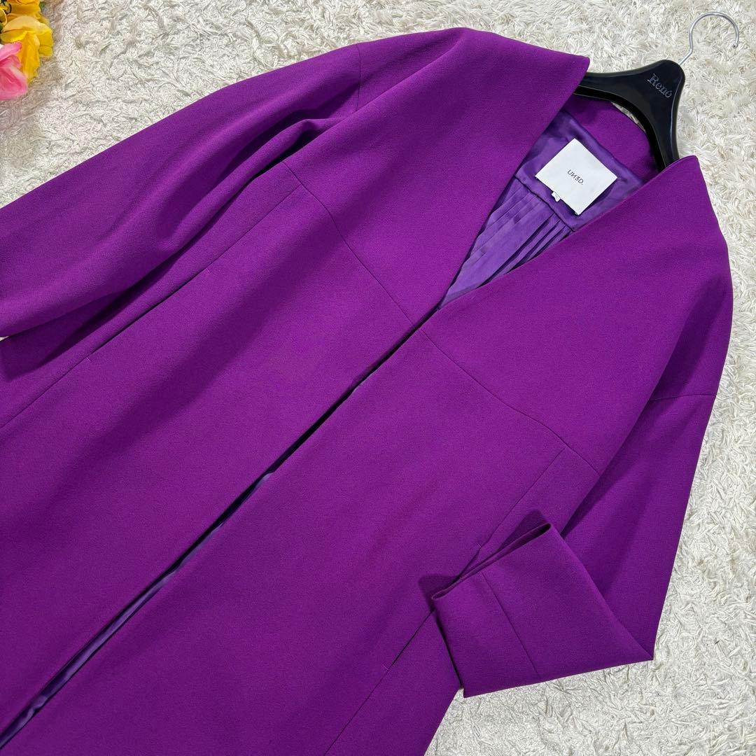 UN3D ノーカラー　プリーツ　フレア　ボタンレス　Aライン　ロングコート