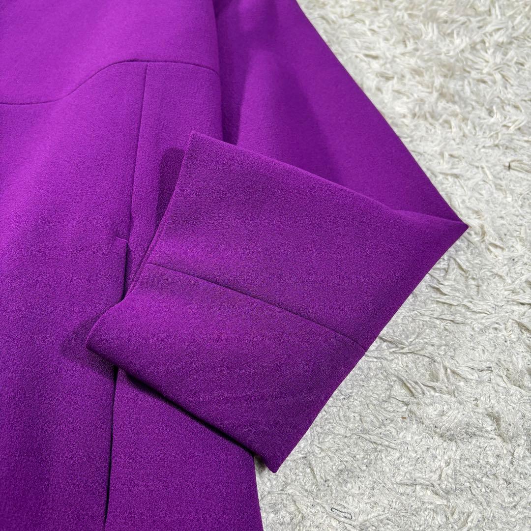 UN3D ノーカラー　プリーツ　フレア　ボタンレス　Aライン　ロングコート