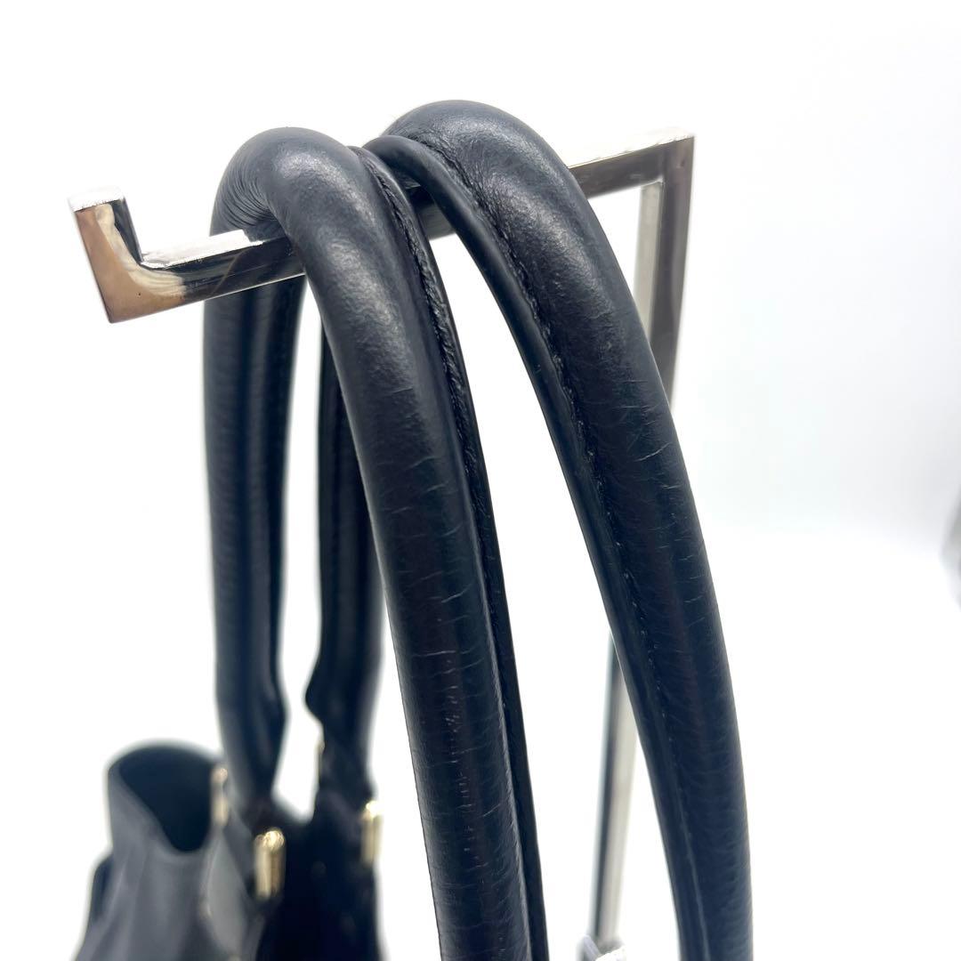 トリーバーチ トートバックハンドバッグ レザー ビッグロゴ タッセル シボ 黒