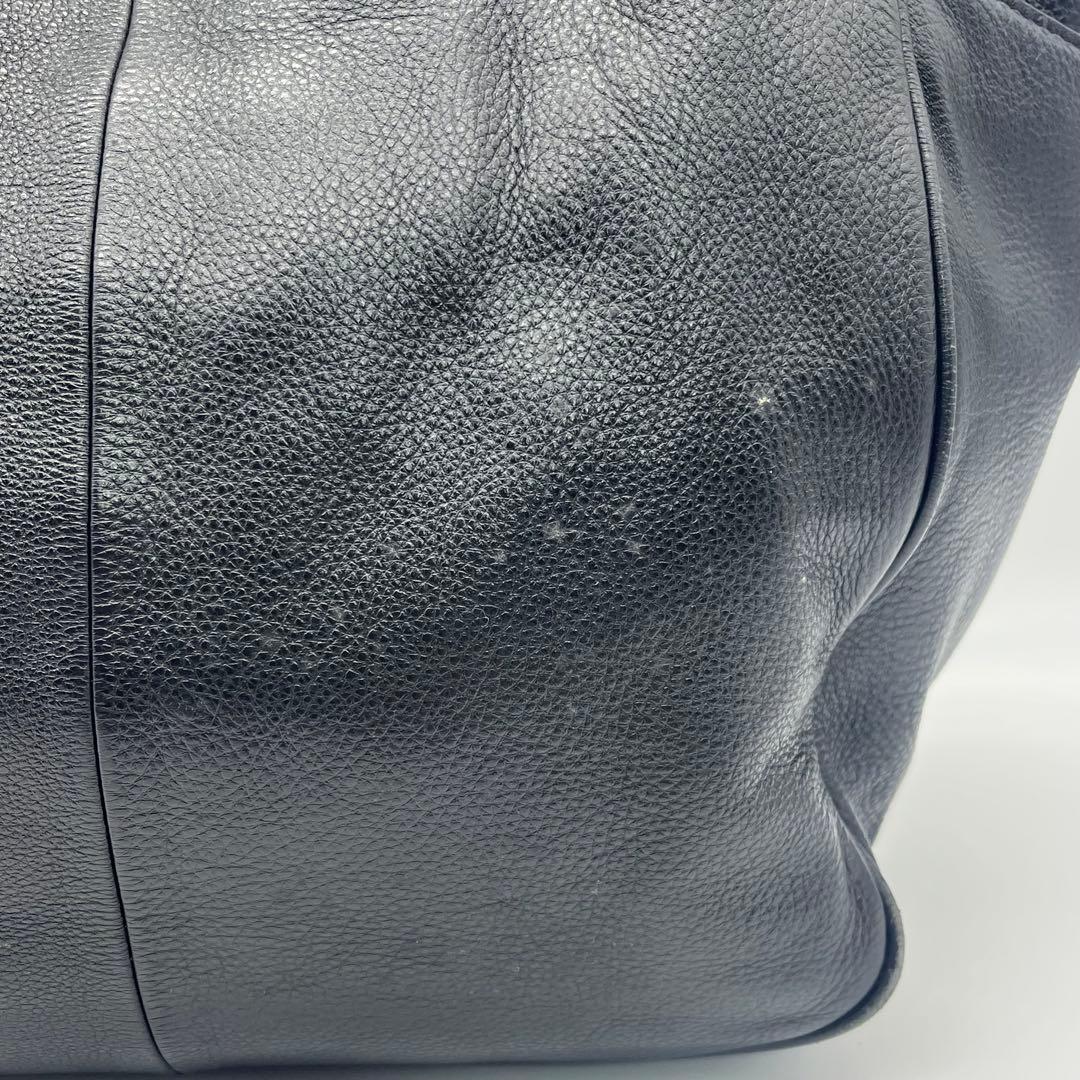 トリーバーチ トートバックハンドバッグ レザー ビッグロゴ タッセル シボ 黒