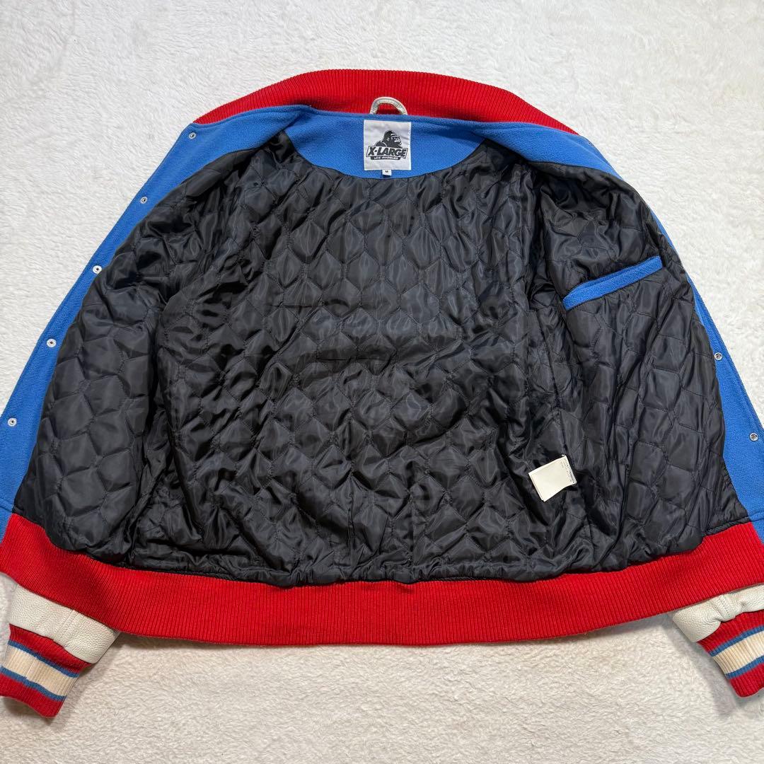 エクストララージ スタジャン パイル生地 刺繍 ブランドロゴ 袖 レザー M