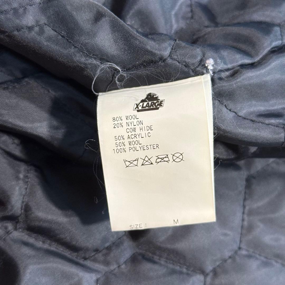 エクストララージ スタジャン パイル生地 刺繍 ブランドロゴ 袖 レザー M