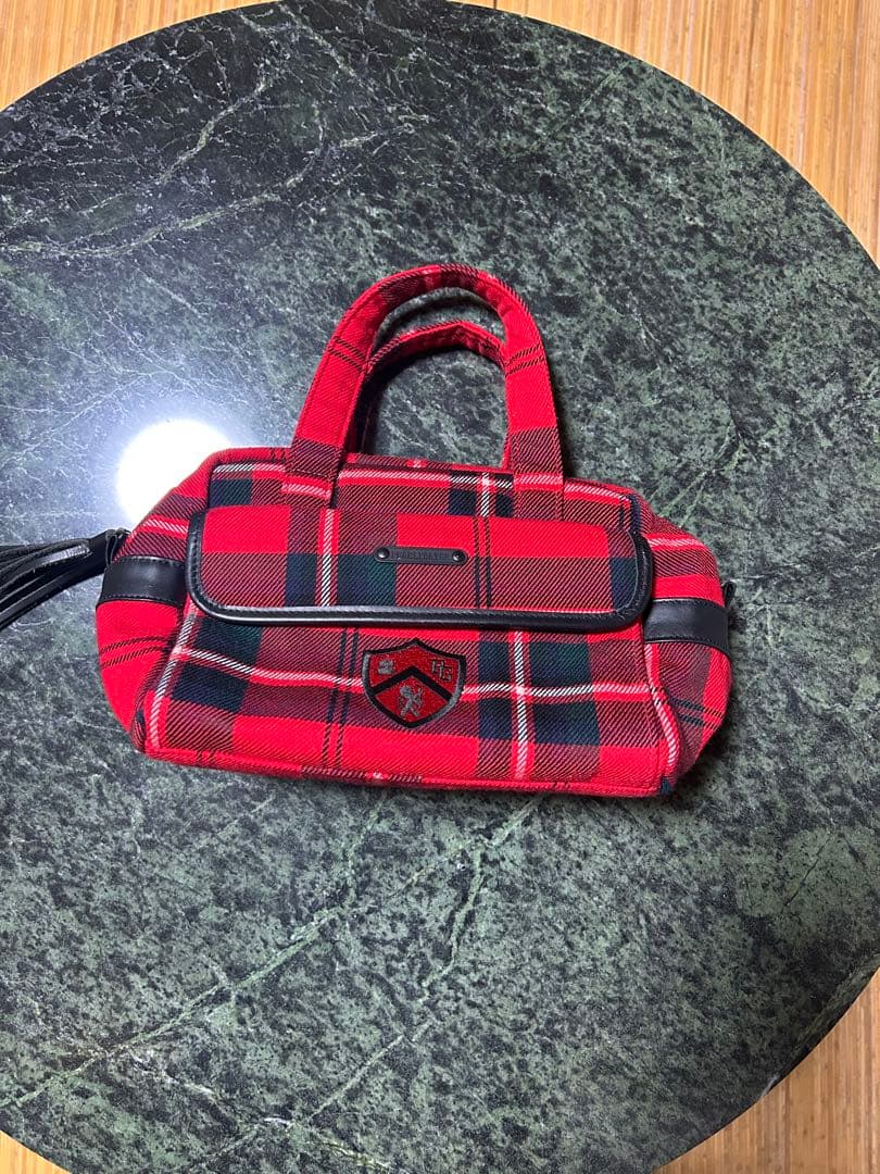 赤と黒のチェック柄カートバッグ