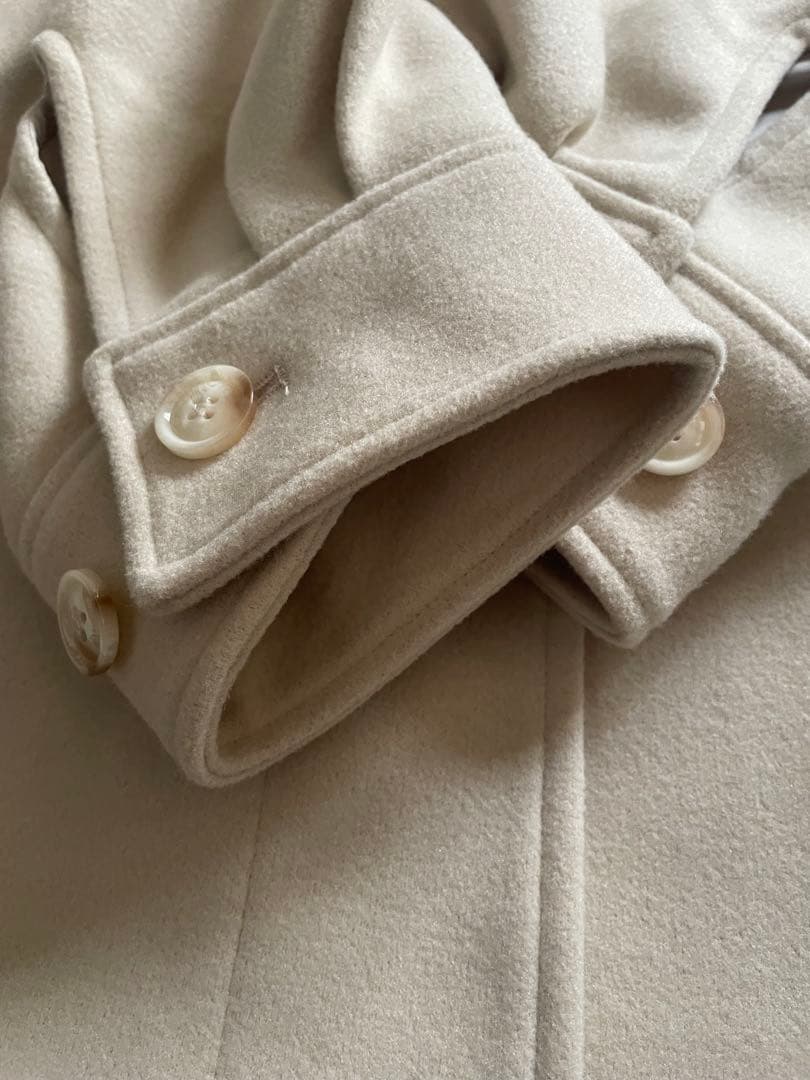 hinari ウェーブデザインミドルコート アイボリー S