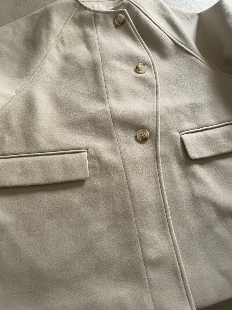 hinari ウェーブデザインミドルコート アイボリー S