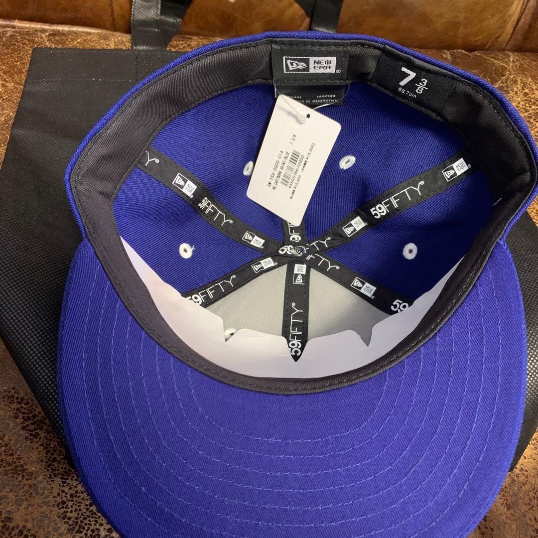 SAINT MICHAEL BORNXRAISED × New Era CAP