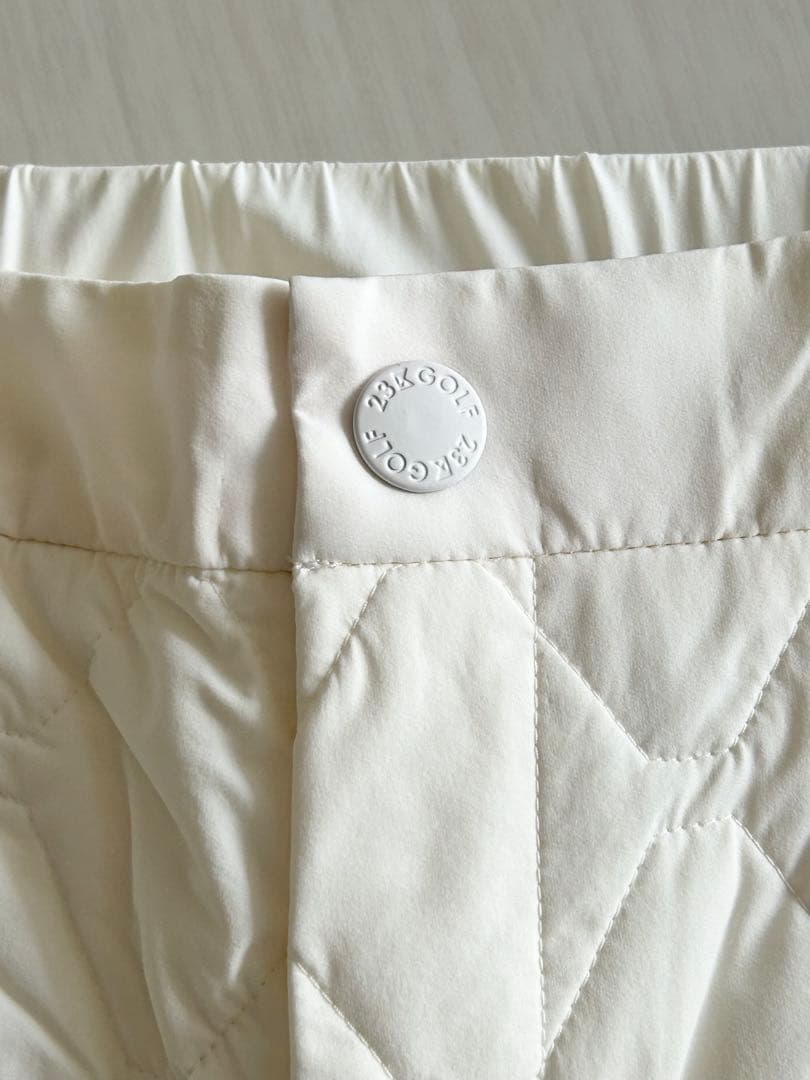 新品23区ゴルフMサイズ 防寒中綿キルティング パンツホワイト