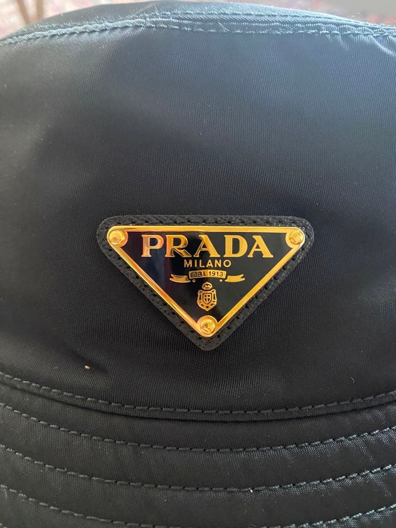 sae_tana223PRADA Re-Nylon バケットハットゴールド