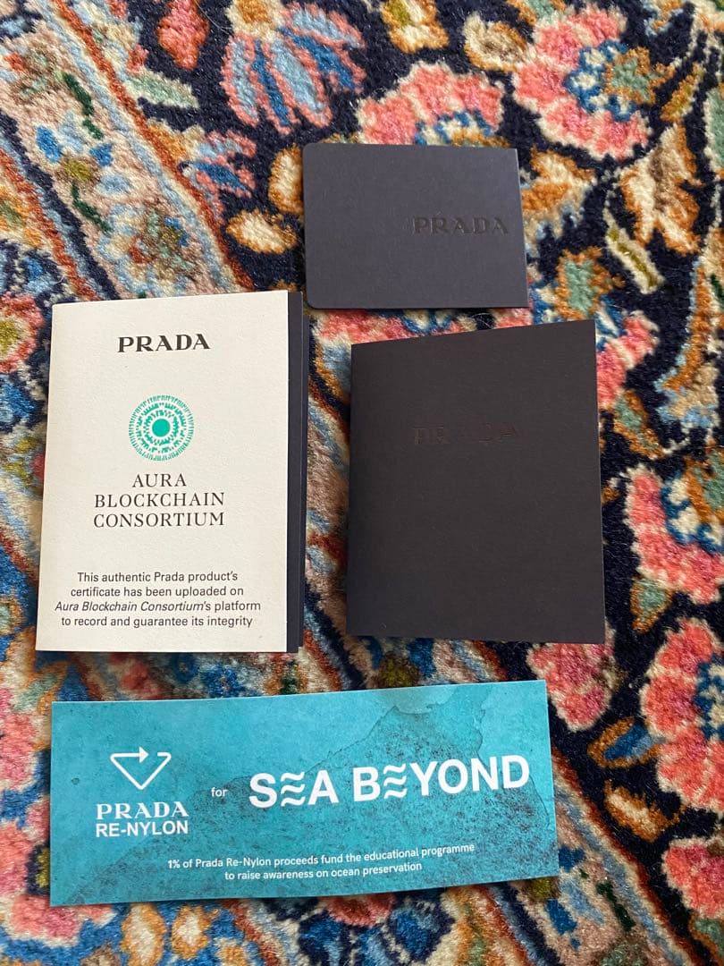 sae_tana223PRADA Re-Nylon バケットハットゴールド